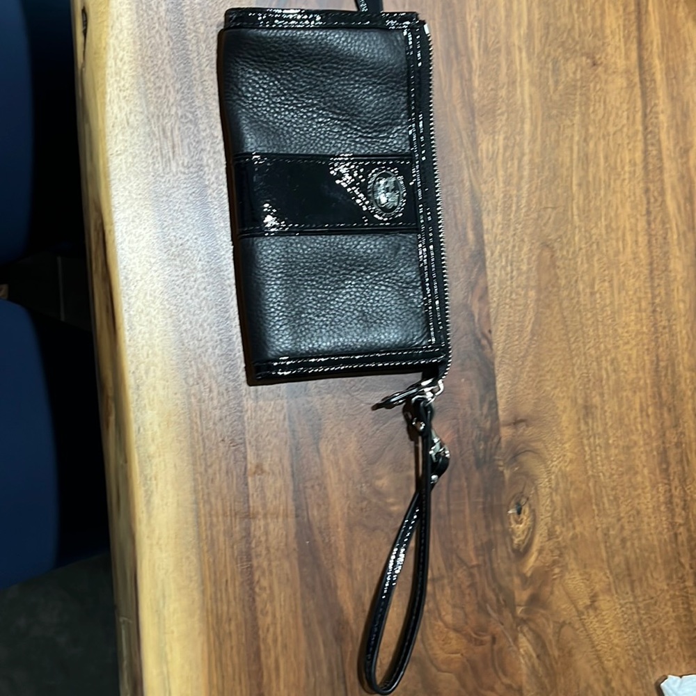 Coach black wristlet with zipper pockets